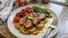 Fläskfilé provençale i ugn – med vitlökssmör, potatisbädd och krämig sås